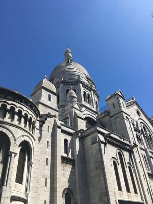Paris: Montmartre Walking Tour with Sacré-Cœur Entry Option - Starting at Abbesses: the Art Nouveau entry that gets you moving