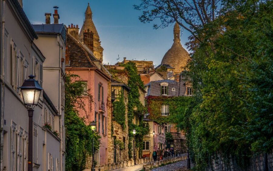 Paris: Montmartre Walking Tour with Sacré-Cœur Entry Option - Moulin de la Galette: from rustic past to postcard Montmartre