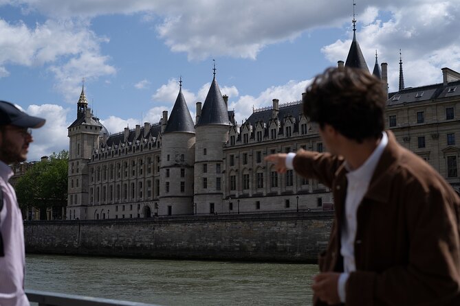 Paris Mysterious and Dark Stories Walking Tour - Small Group - Saint-Germain-l’Auxerrois and the Louvre: Seeing Familiar Places Differently