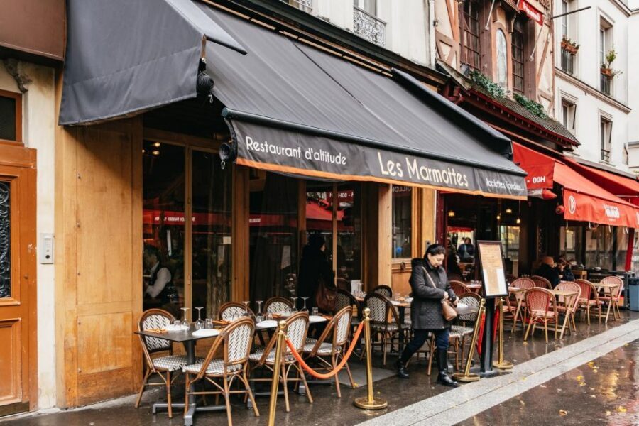 Paris: No Diet Club - Winter Unlimited Cheese Tour ! - Entering a Paris raclette restaurant from Les Marmottes