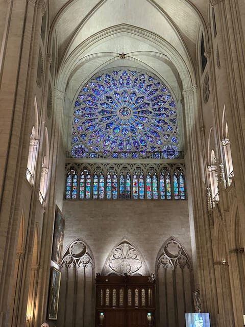 Paris: Notre Dame Cathedral Guided Tour of the Neighborhood - Notre-Dame cathedral: free entry, guided time, and the audio plan