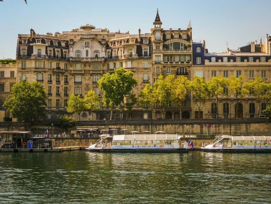 Paris: Notre Dame Exteriors and Ile de la Cité Walking Tour - Stop-by-stop: Pont Neuf, Henri IV, and why Place Dauphine feels calmer