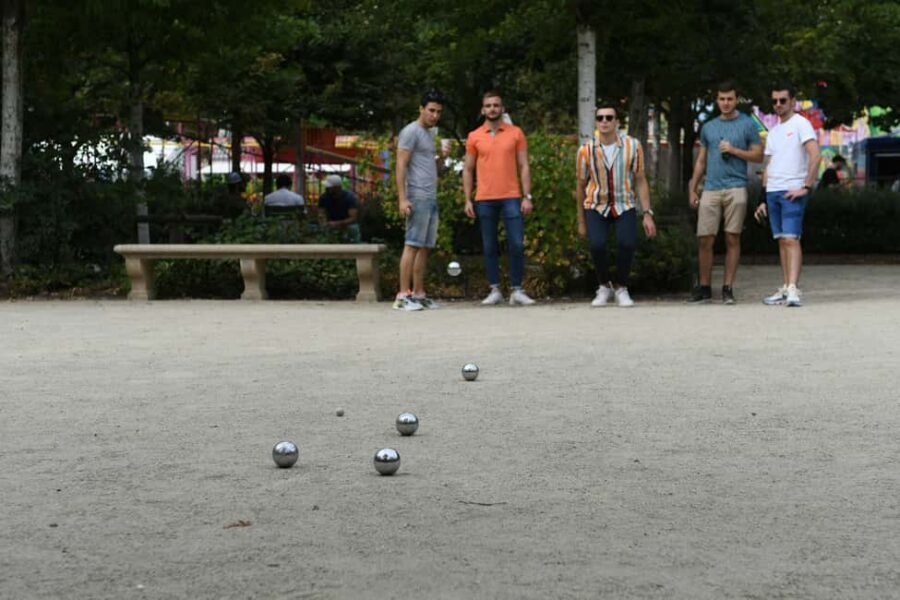 Paris: Pre-Dinner Drinks with Petanque Game (Bocce Ball) - Boules in Place Bastille: a Paris evening that feels real