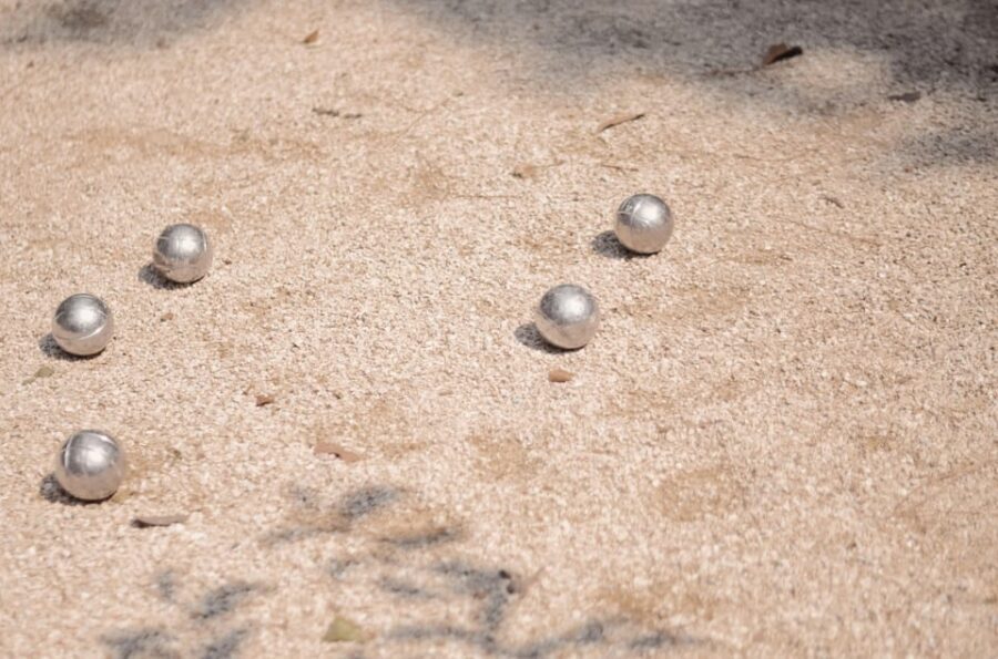 Paris: Pre-Dinner Drinks with Petanque Game (Bocce Ball) - The game in the boule alleyway: friendly competition, Paris style