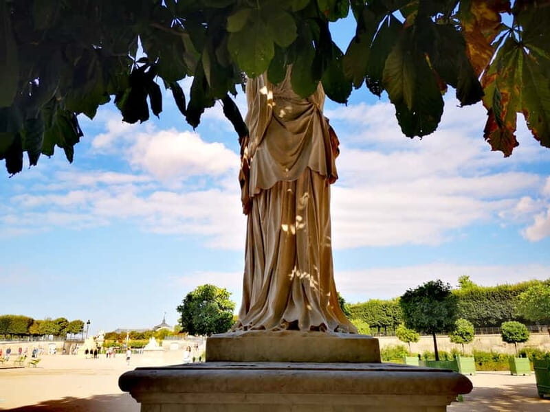 Paris: private city tour with seine river cruise - Palais-Royal gardens and the bird-feeding moment