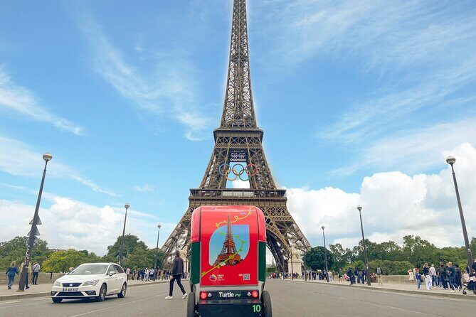 Paris Private Sightseeing Guided Tour by Electric Rickshaw - Eiffel Tower, Statue of Liberty area, and the Flame of Liberty