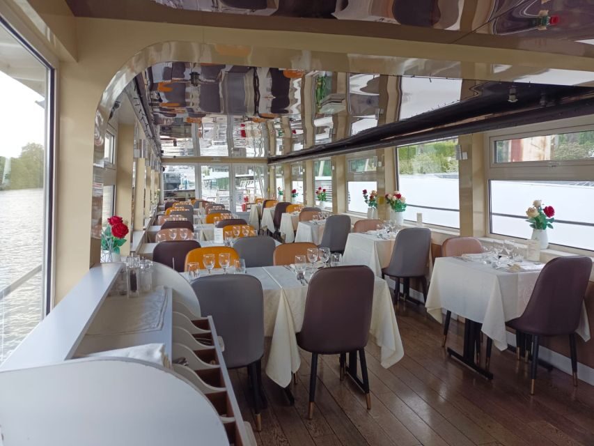 Paris : Seine River Lunch cruise from Eiffel Tower - The cozy on-board vibe: outside terrasse plus restaurant comfort