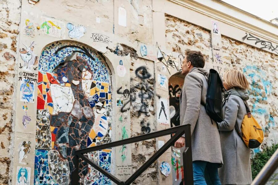 Paris: Street Art Walking Tour with a Street Artist Guide - Following artist footsteps in Montmartre, including old workshop addresses