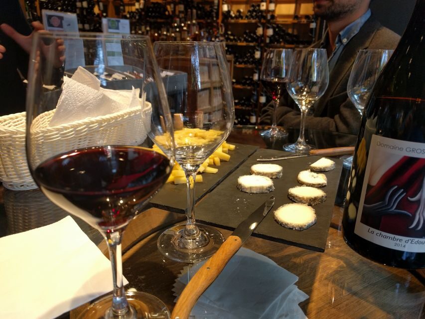Paris: Wine and Cheese Tasting - Walking into a cave à vin boutique in Paris