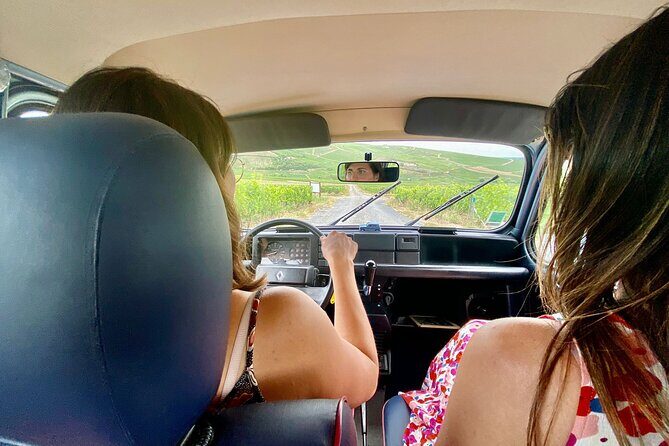 Private Champagne Experience in a vintage car from Epernay - Chouilly vineyards: learning Sabrage and tasting mid-field