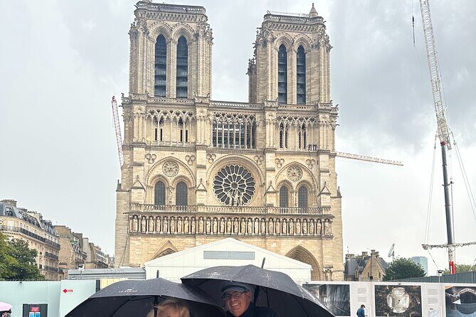 Private Paris tour By Minivan, private guide, Champagne(optional) - Notre-Dame and the Arc: fast photo time with real context