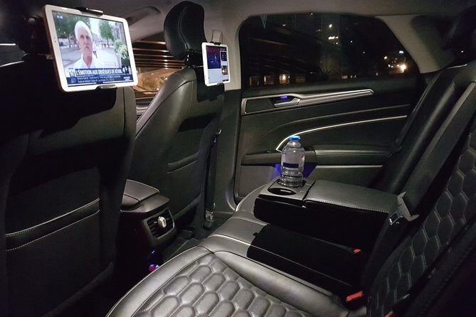Private Shuttle from Charles de Gaulle Airport to Paris: Premium Service - Your ride: sedan or minivan, plus WiFi and iPad comforts