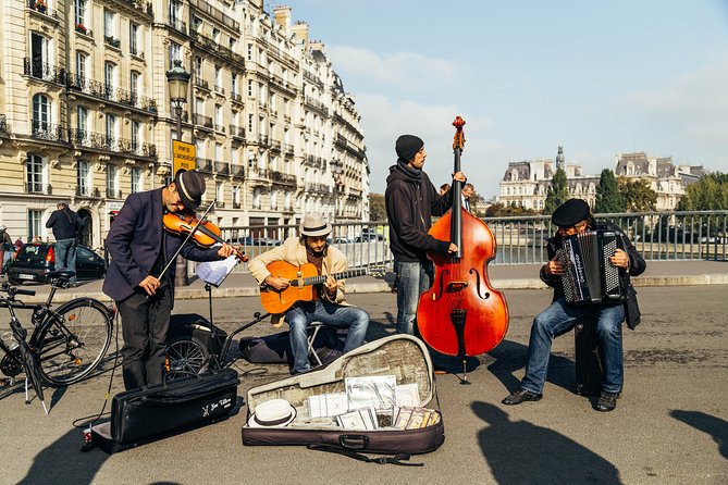 PRIVATE TOUR: Highlights & Hidden Gems of Paris With Locals - Galerie Vivienne, Opera Bastille area, and a 360-degree rooftop view