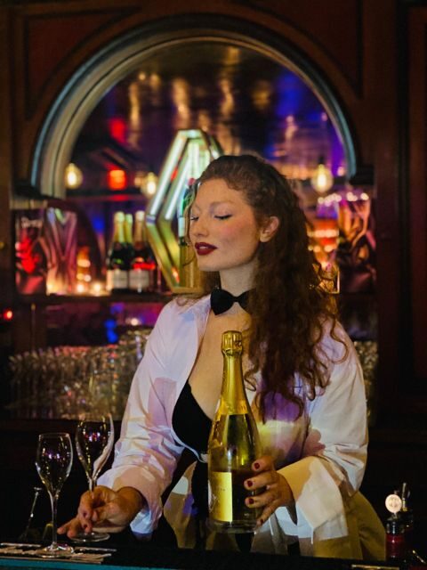 Secret Square Paris : Parisian Strip-Tease Cabaret Ticket - Main room experience: dim lights, center stage, and relaxed seating