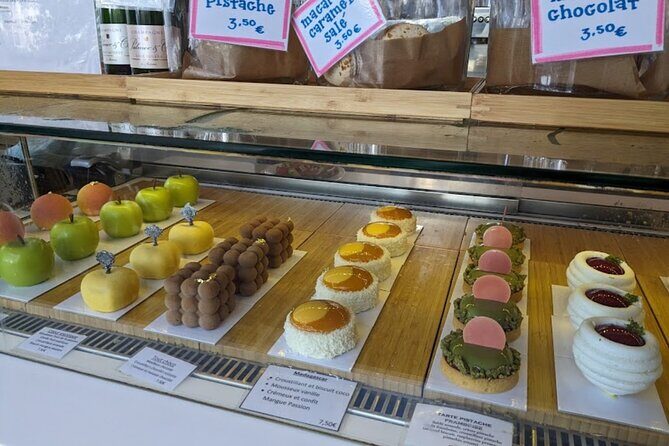Sweet walking food tour in Paris with local guide - Stop 1: Pierre Hermé at Café Pierre Hermé and why macarons are never just macarons